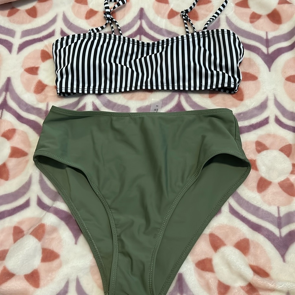 White/black stripes swimsuit with green bottoms